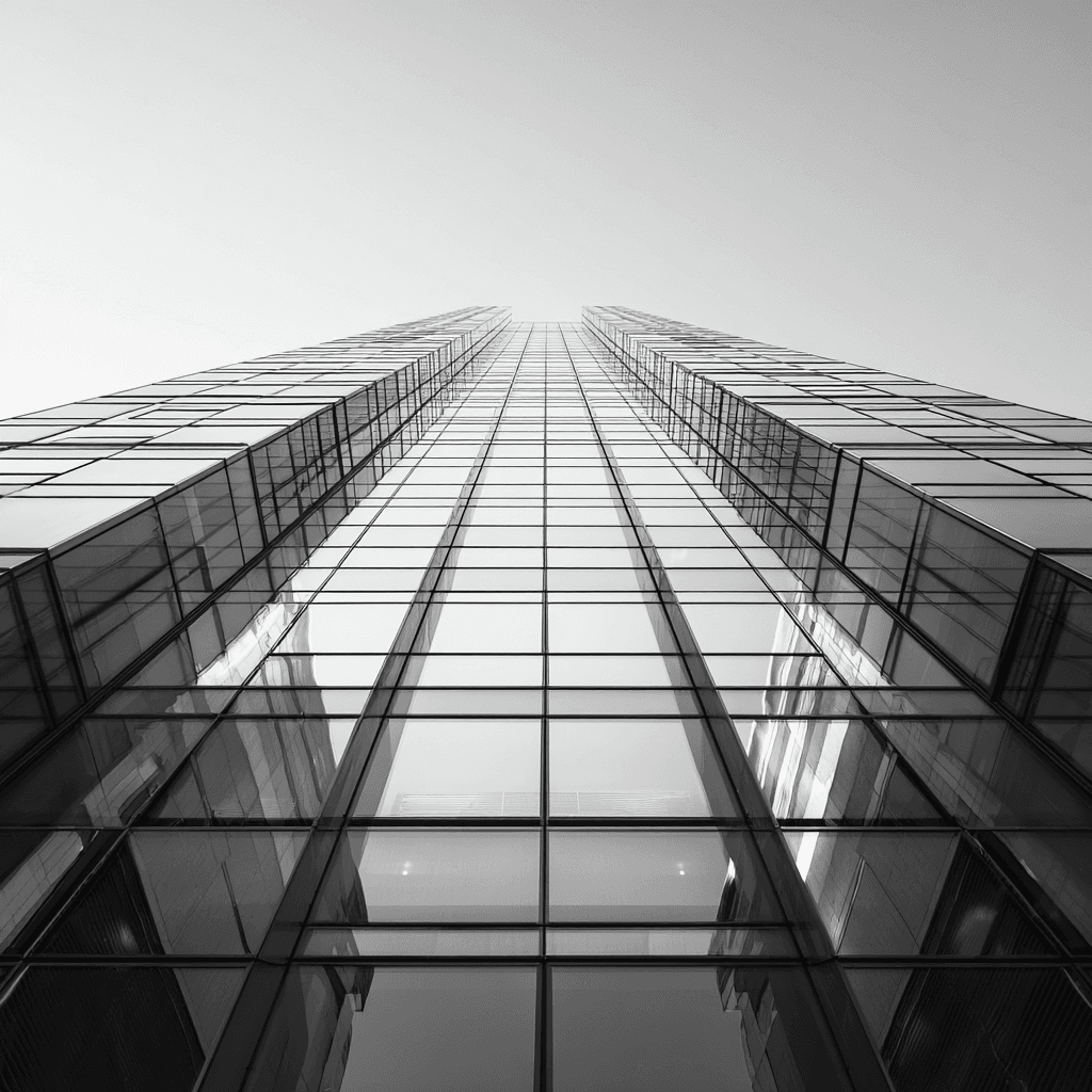Modern glass and steel architecture representing engineered precision